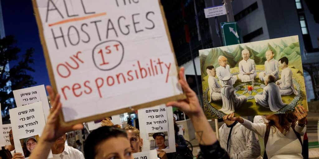 2023-11-22t032142z_1_lynxmpejal03l_rtroptp_4_israel-palestinians-hostages.jpg